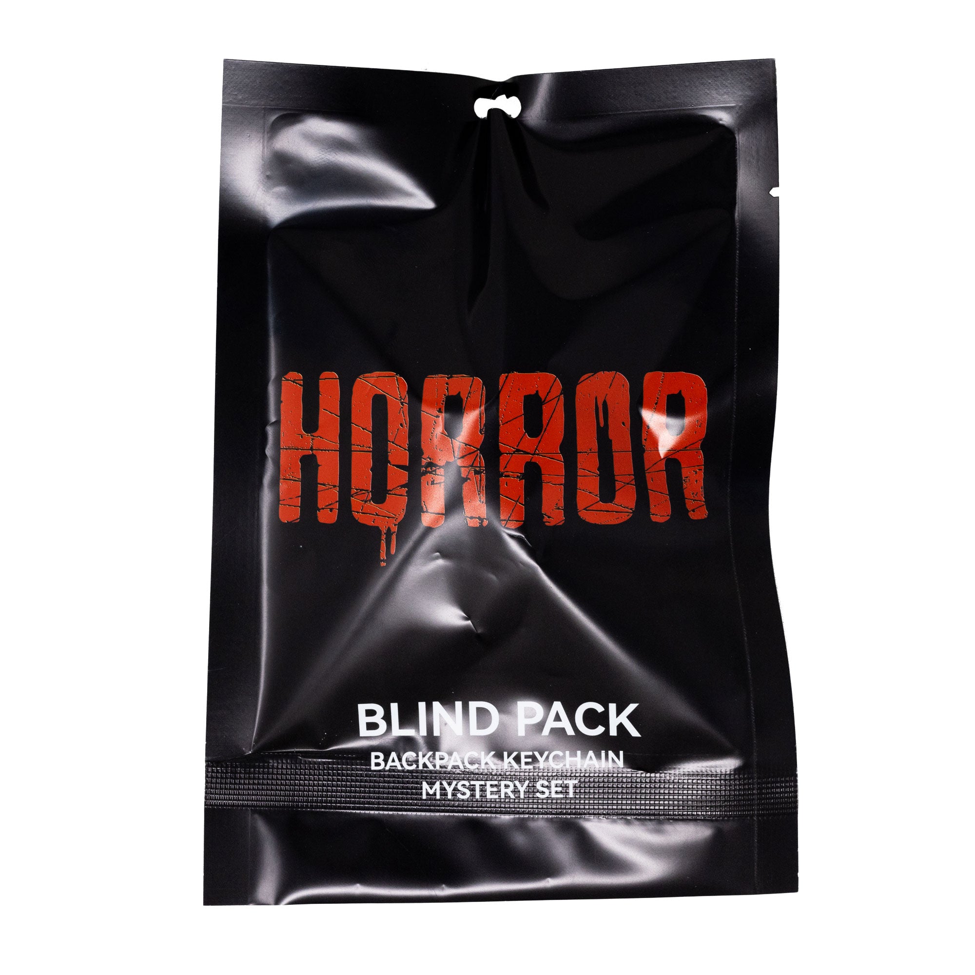 Warner Bros. Horror Movies Mystery Backpack Keychain Charm Blind Box Series, Nightmare on Elm St. Street Sign, Jason's Knife, Pennywise's Balloon, Annabelle, or a Lost Boys Milk Carton Blind Box Keychains Warner Bros. Horror Movies