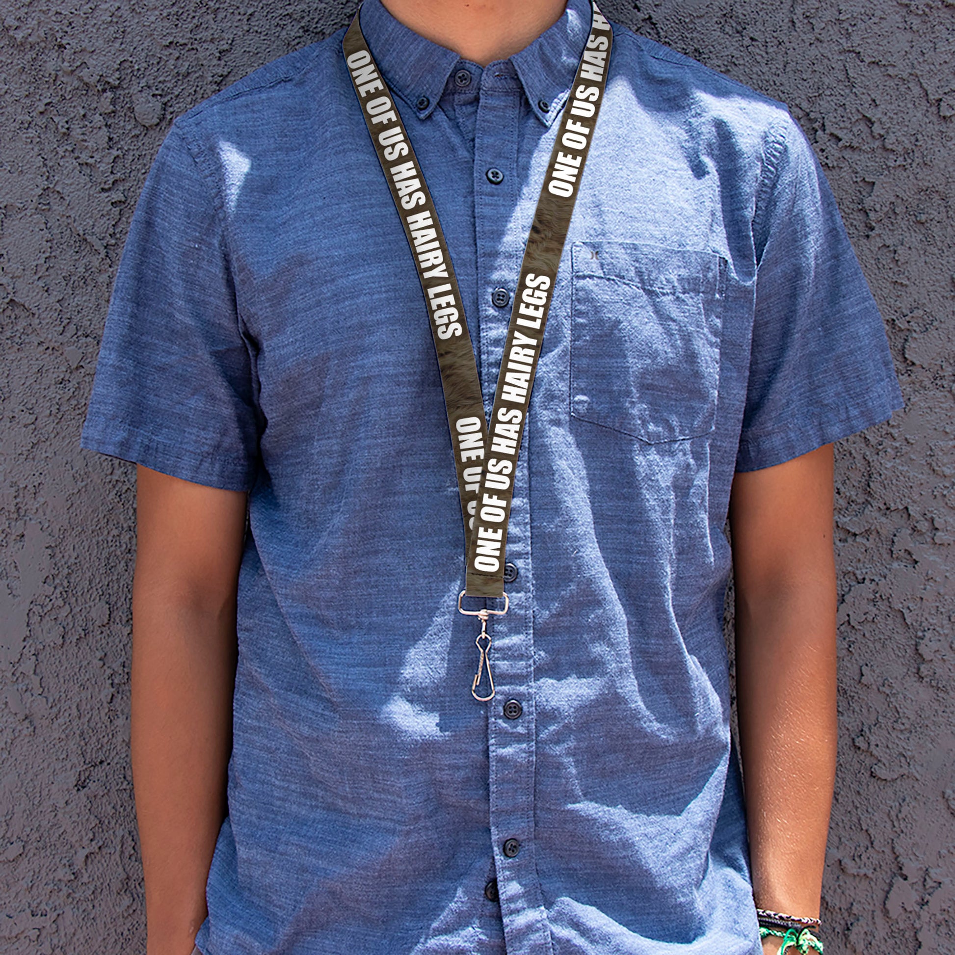 Buckle-Down Lanyard - ONE OF US HAS HAIRY LEGS/Fur Tan/White Lanyards Buckle-Down