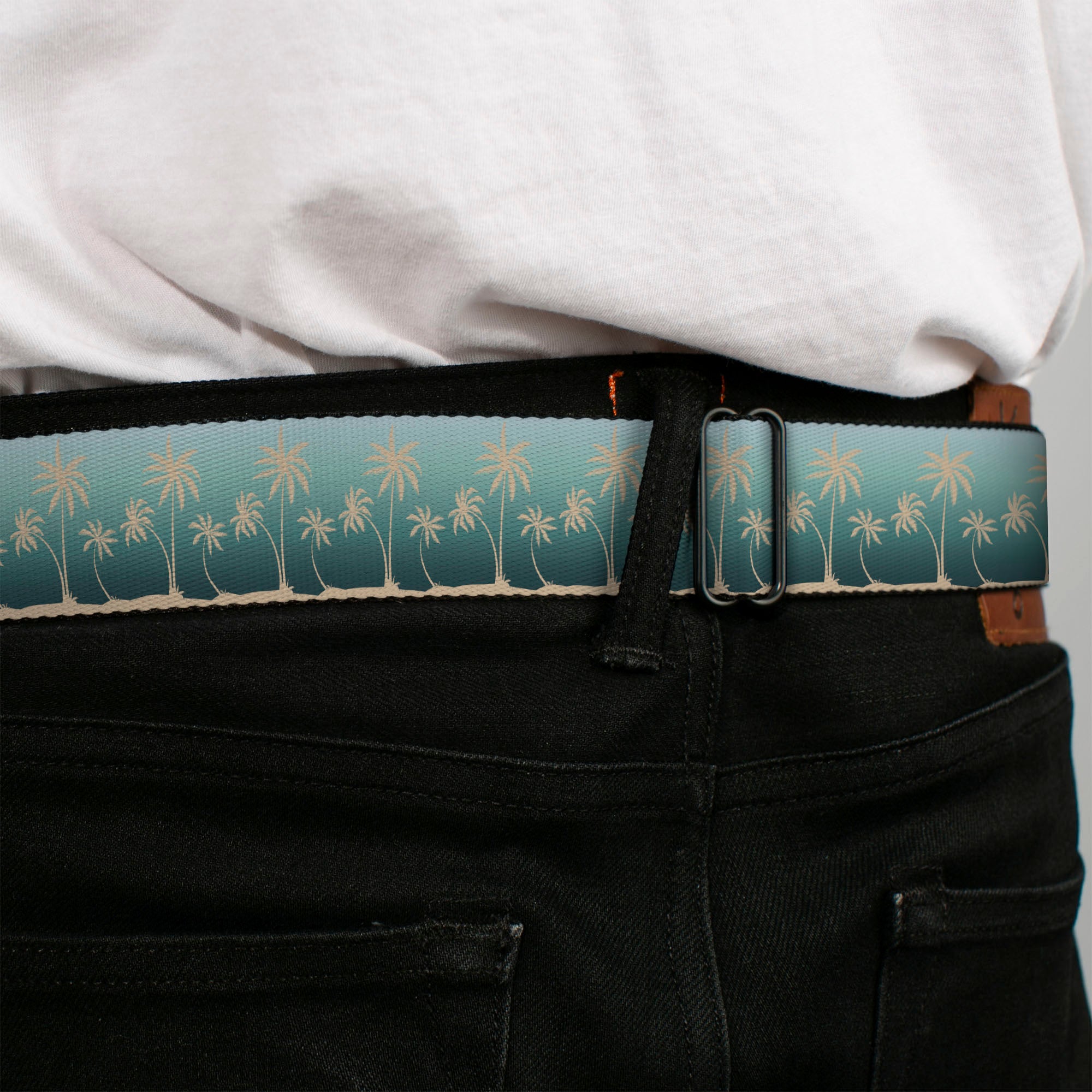 BD Wings Logo CLOSE-UP Black/Silver Seatbelt Belt - Palm Treeline Silhouette Aqua Fade/Tan Webbing Seatbelt Belts Buckle-Down