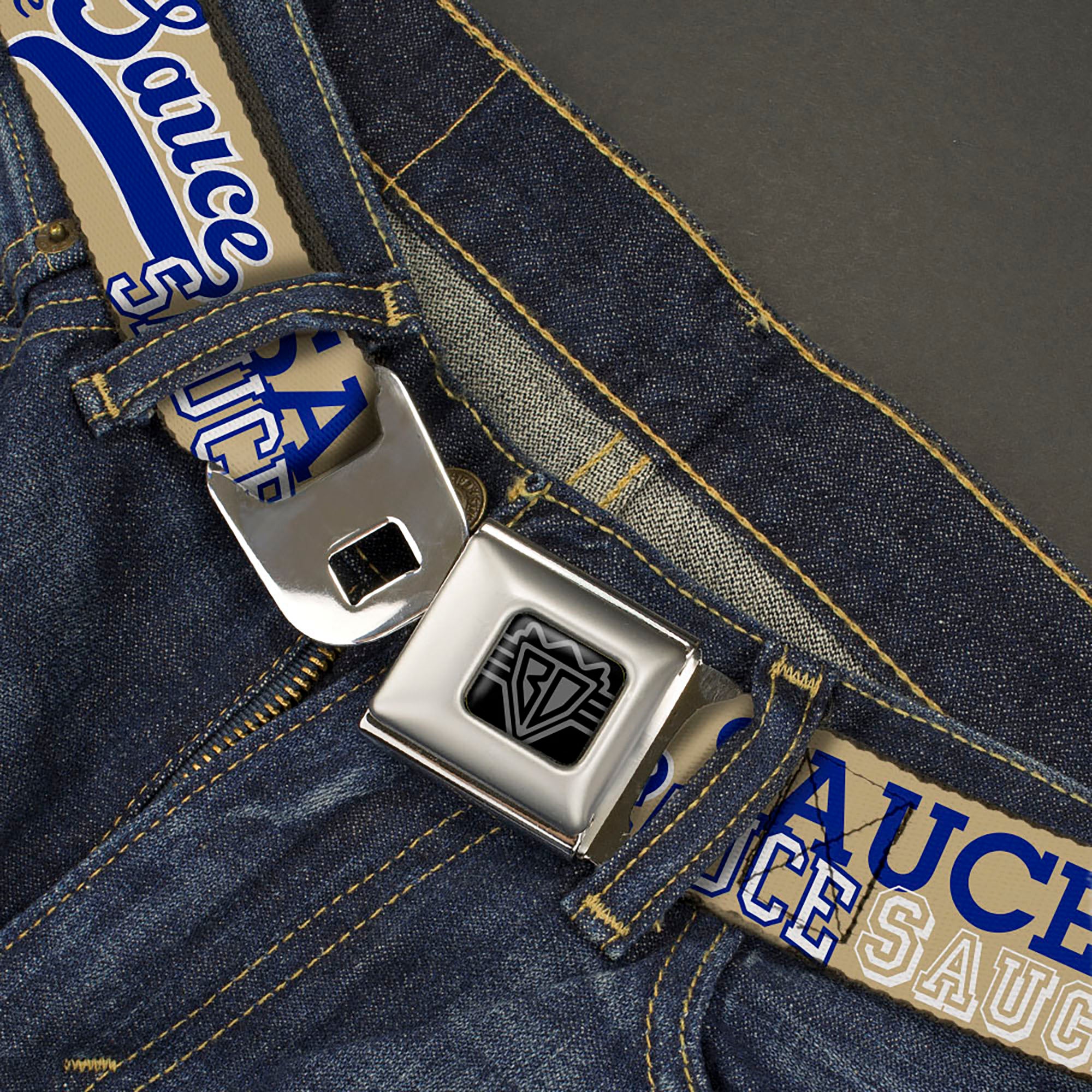 BD Wings Logo CLOSE-UP Black/Silver Seatbelt Belt - SAUCE Typography Collage Tan/White/Blue Webbing Seatbelt Belts Buckle-Down