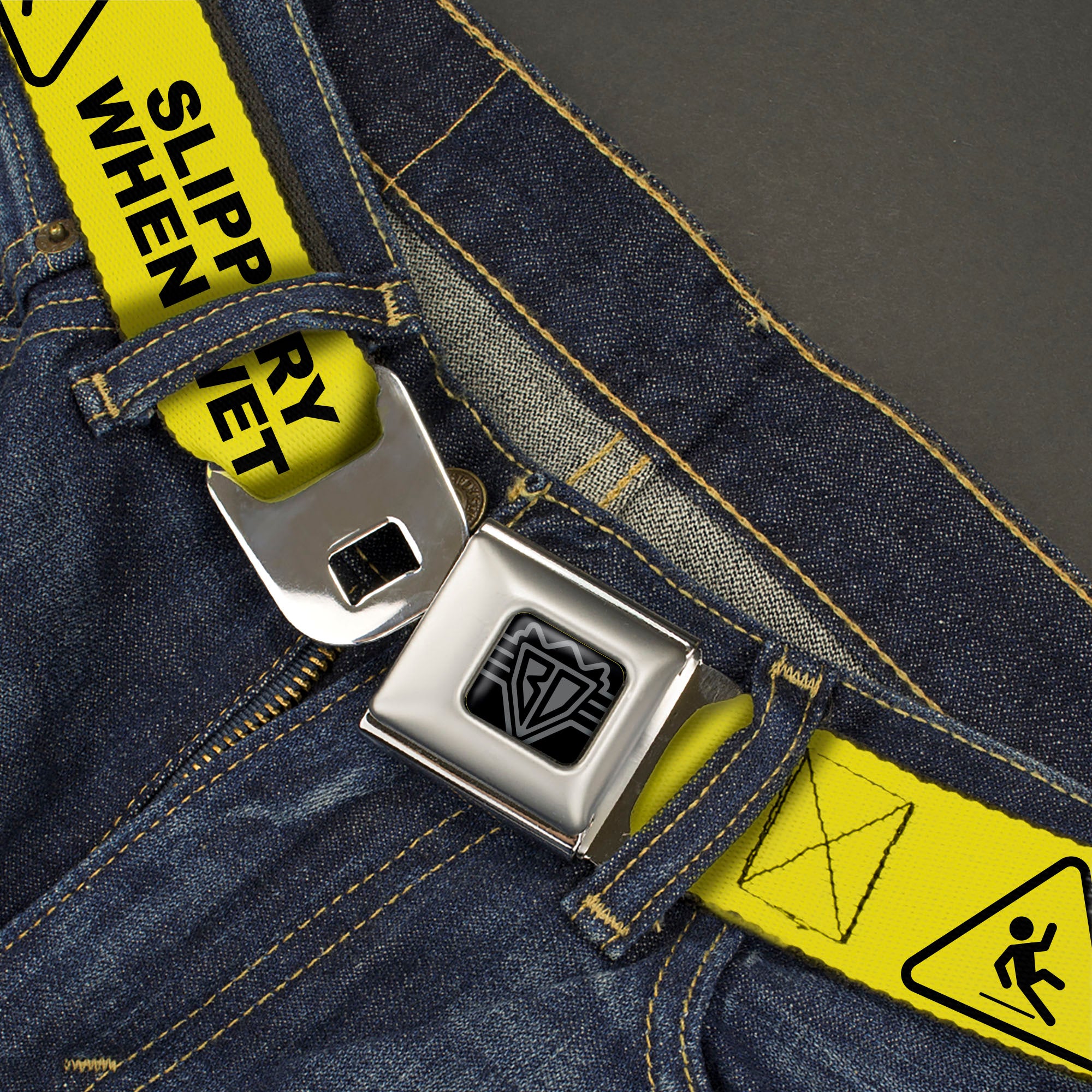 BD Wings Logo CLOSE-UP Black/Silver Seatbelt Belt - SLIPPERY WHEN WET Warning Yellow/Black Webbing Seatbelt Belts Buckle-Down