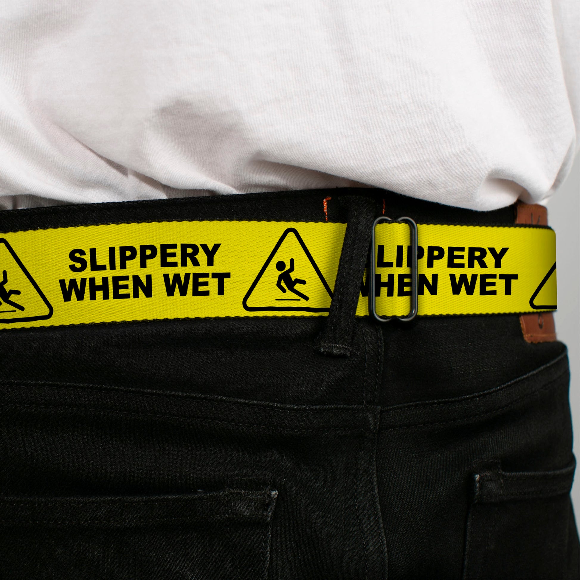 BD Wings Logo CLOSE-UP Black/Silver Seatbelt Belt - SLIPPERY WHEN WET Warning Yellow/Black Webbing Seatbelt Belts Buckle-Down