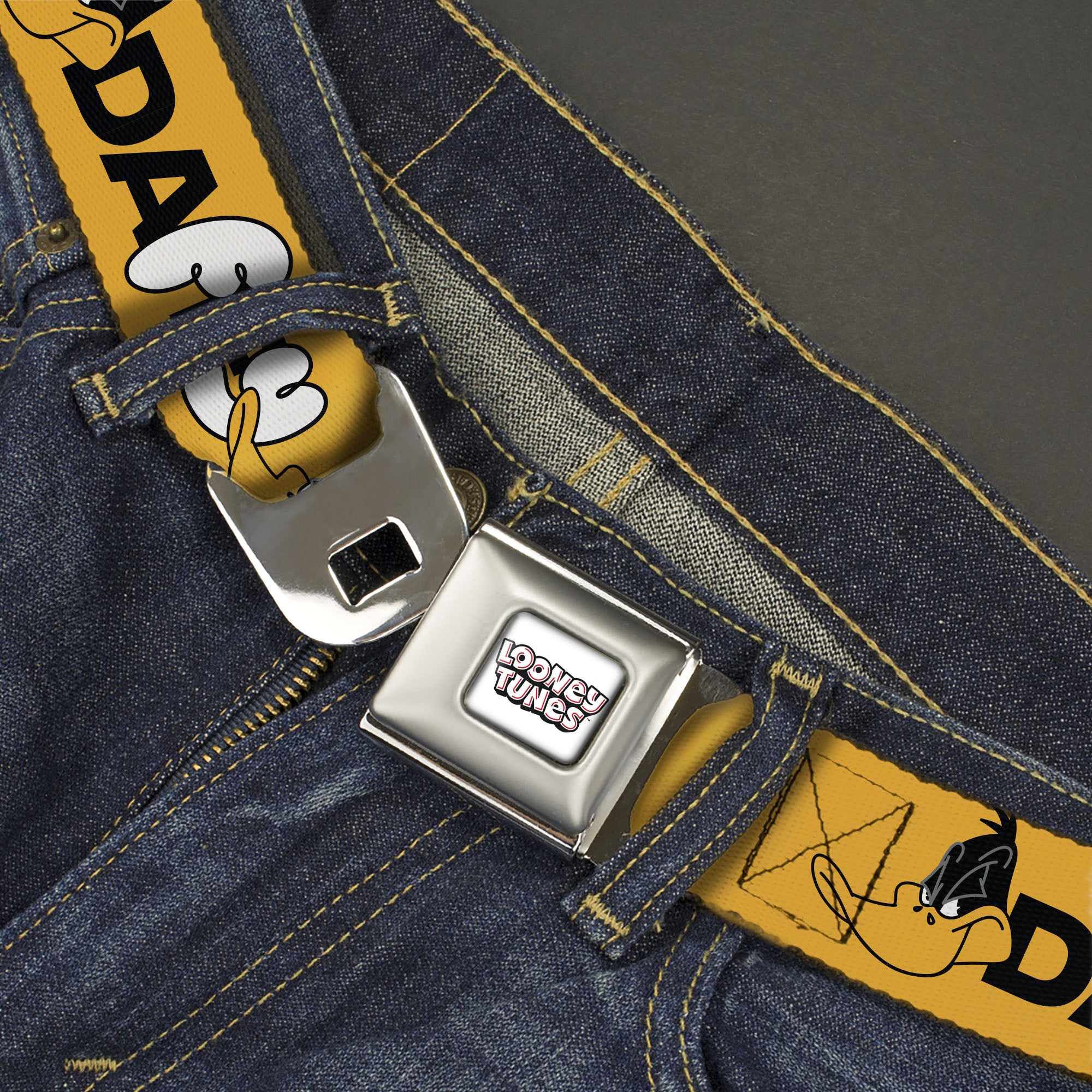 LOONEY TUNES Text Title Logo Full Color White Seatbelt Belt - DAFFY DUCK Smiling Face Text Orange Webbing Seatbelt Belts Looney Tunes