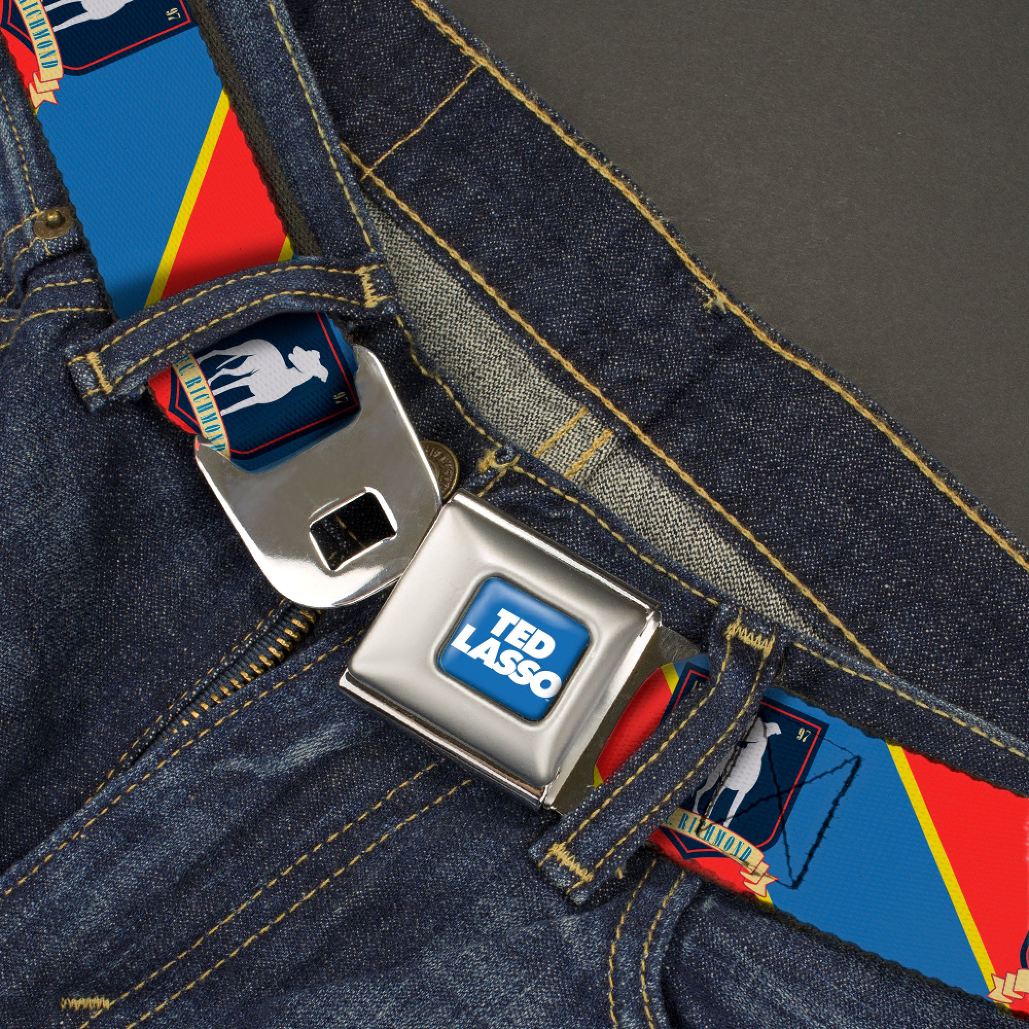 TED LASSO Title Logo Full Color Blue/White Seatbelt Belt - Ted Lasso AFC Richmond Logo Stripe Blue/Yellow/Red Webbing Seatbelt Belts Ted Lasso