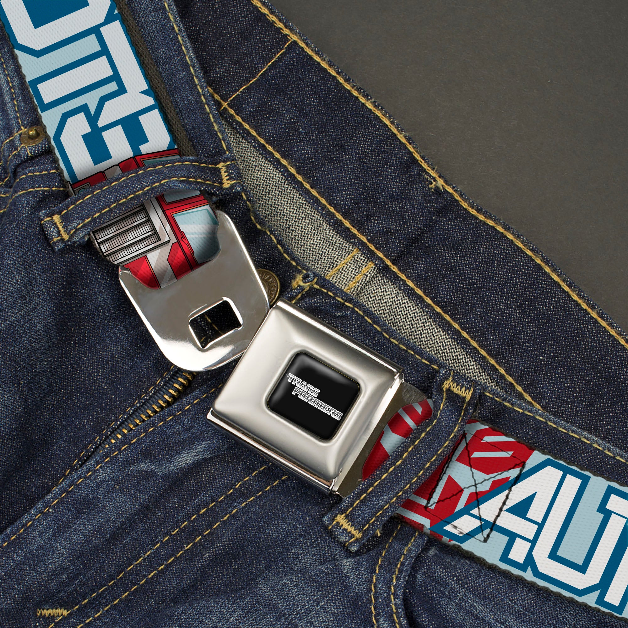 TRANSFORMERS Title Logo Full Color Black/White Seatbelt Belt - Transformers AUTOBOTS Optimus Prime Semi Truck Collage Light Blue Webbing Seatbelt Belts Hasbro