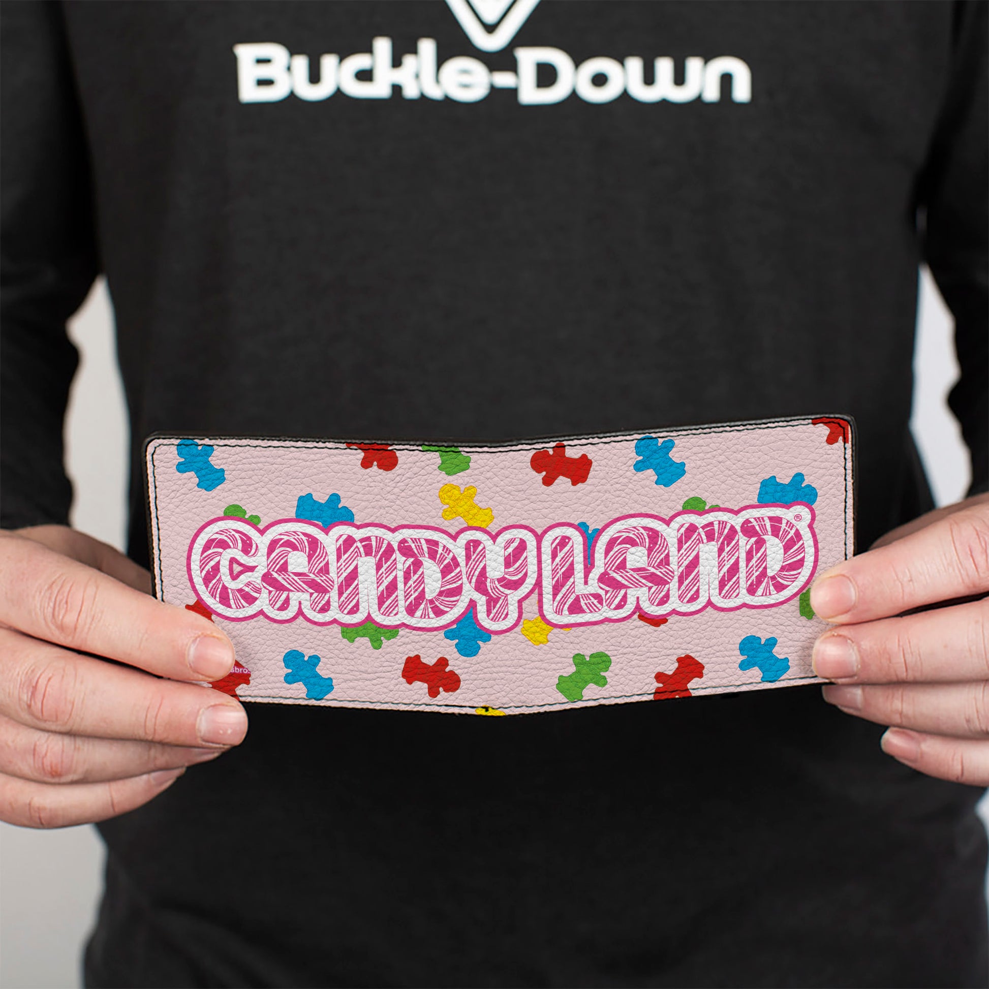 Bi-Fold Wallet - CANDYLAND Title Logo and Gingerbread Token Icons Scattered Pink Bi-Fold Wallets Candy Land